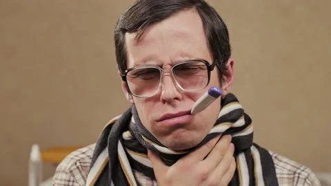 Man in scarf and thermometer Video stock 146029903