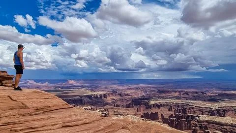 Man with scenic view on Split Mountain Canyon seen from Grand View Point Ov.. Stock Photos