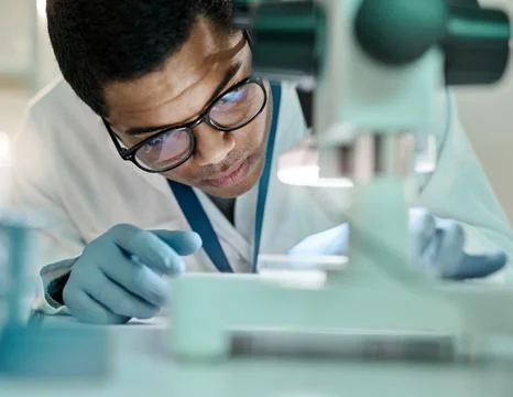 Man, scientist and sample with microscope in lab for research, disease stud.. Stock Photos