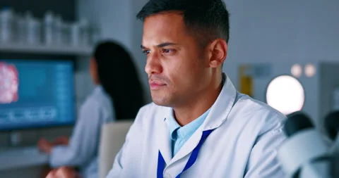 Man, scientist and thinking in research on computer for healthcare breakthrough Stock Footage 237790080