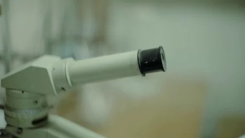 Man scientist looking microscope in old Lab. close up Stock Footage 82471617