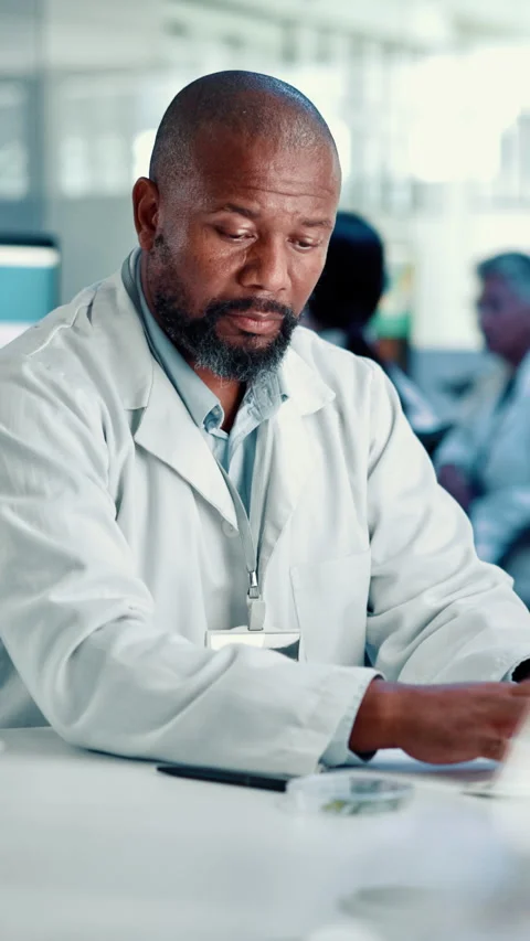 Man, scientist or biologist with sample on computer at lab for exam, test Stock Footage 310604493