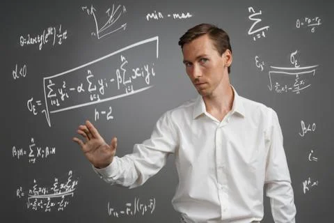 Man scientist or student working with various high school maths and science Stock Photos