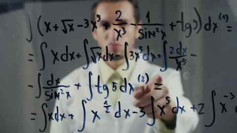 Man Scientist thinks over the solution of the integral equation. The Stock Footage