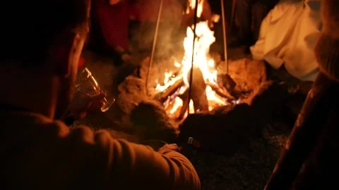 Man scoops mulled wine from a saucepan. Video stock 138340221