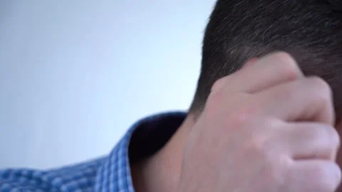 Man Scratches His Ear. Close-up of the Neck and Ear. Stock Footage 166996546