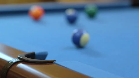 Man Scratching Cue Ball on Blue Billiards Table Vídeo Stock 65971974