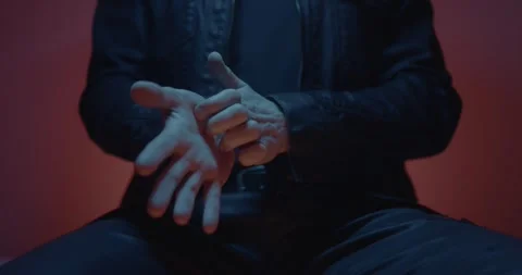 Man scratching hands nervously Stock Footage 315403942