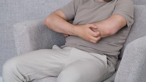 Man scratching his arm Stock Footage 277270660