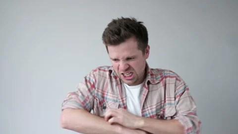 Man scratching the itch with hand. Problem with skin after mosquito bite. Stock Footage 119643149