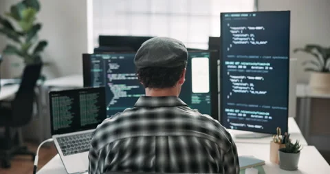 Man, screen and computer in office for programming, coding and update firewall Stock Footage 346759918