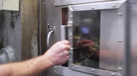 Man Screwing In a screw Stock Footage 66763389