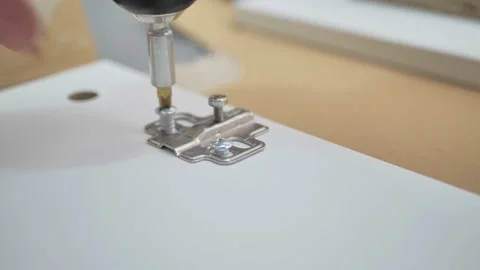 Man screws a self-tapping screw with a screwdriver. Macro shooting. Close-up Stock Footage 222635162