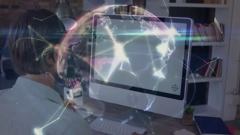 Man scribbling notes facing screen at desk visualizing tech network evolving Stock Footage 312099196