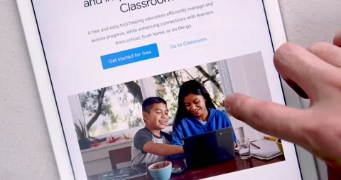 Man scroll and swipe Google Classroom website on iPad Stock Footage 149877825