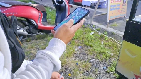 Man scrolling and browsing information on cell phone. Stock Footage 239533081