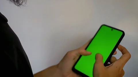 Man Scrolling and Touching Chroma Key Screen Stock Footage 289922528