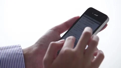 Man scrolling and using phone Stock Footage 158964056