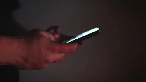 Man scrolling on his phone Stock Footage 169769779