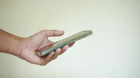 Man scrolling mobile phone screen. internet browsing, social media and marketing Stock Footage 322109937