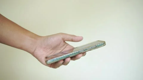Man scrolling mobile phone screen. internet browsing, social media and marketing Stock Footage 322109945
