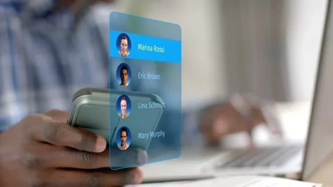 Man scrolling phone contact list in tech, floating UI cycling and selecting Mary Stock Footage 333336166