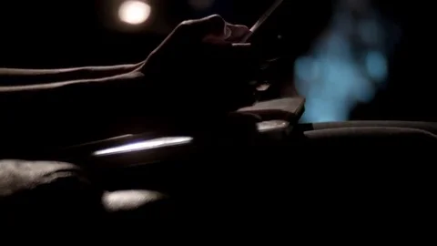 Man Scrolling On Smart Phone Close-up tilt down Video stock 69268314