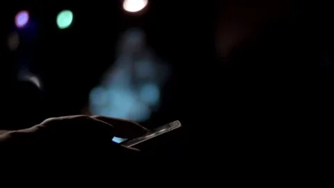 Man Scrolling On Smart Phone Close-up pan Stock Footage 69268789