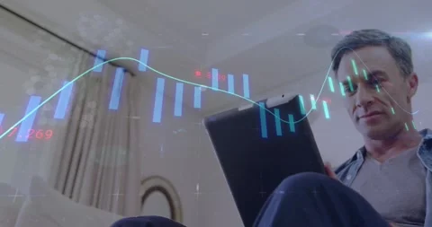 Man scrolling tablet screen and revealing holographic financial chart over sofa Stock Footage 328005646