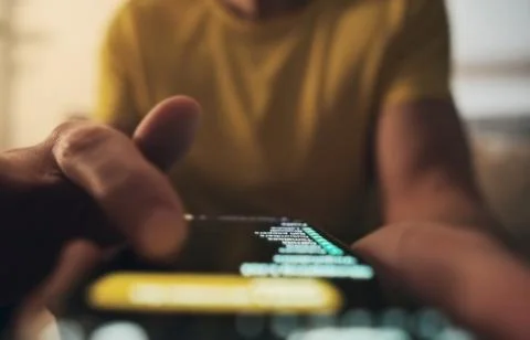 Man Scrolling Task List On Smartphone Screen Stock Photos
