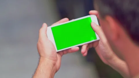 Man scrolling through information on a mobile Stock Footage 112152696