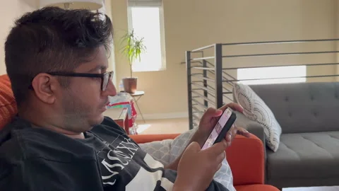 Man scrolling through Instagram. Stock Footage 246701958