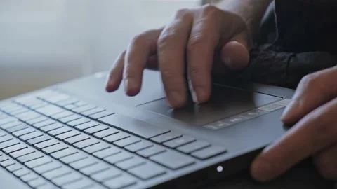 Man scrolling on the touchpad Stock Footage 163993550
