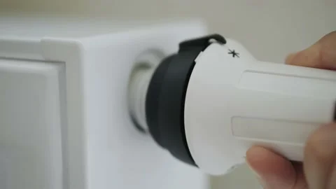 A man scrolls a mechanical counter with numbers, turning it on and off Stock Footage 153555641