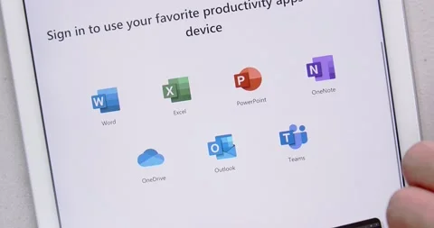 Man scrolls Microsoft Office website on iPad Stock Footage 150006344