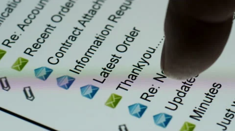Man scrolls through emails on tablet screen Stock Footage 64340573