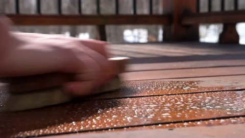 Man scrubbing deck in 4K 스톡 동영상 150498656