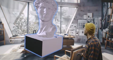 Man Sculpting a Classical Bust in Virtual Reality Art Studio Holographic Video stock 284970309