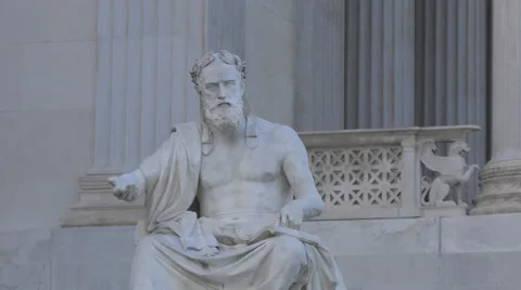 Man sculpture in front of the Austrian Parliament Building, Vienna 動画素材 59572249