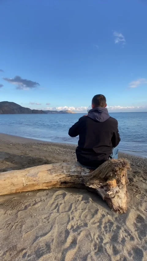 Man by the sea with wine Stock Footage 320354471