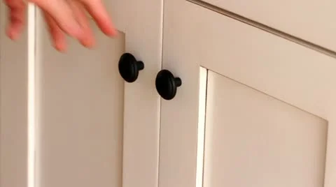 Man searches through kitchen drawer Stock Footage 15508010