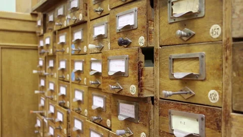 Man searching in document file database Stock Footage 99659626