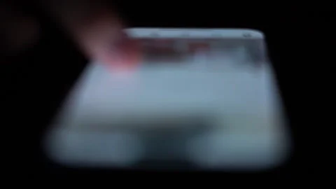 Man searching social networks using smartphone Stock Footage 260953557