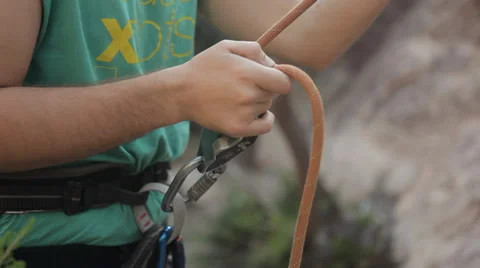 Man Securing Rock Climbing Video stock 38502209