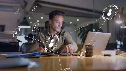 Man seeing network icon, shifting from laptop to phone as overlay expanding to Stock Footage 335761762