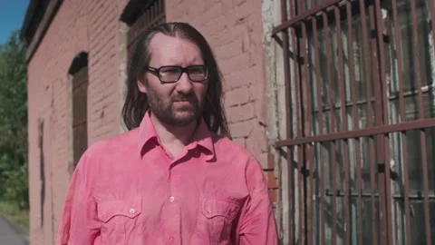 A man seems to be released out of the prison. a desperate person Stock Footage 157992846