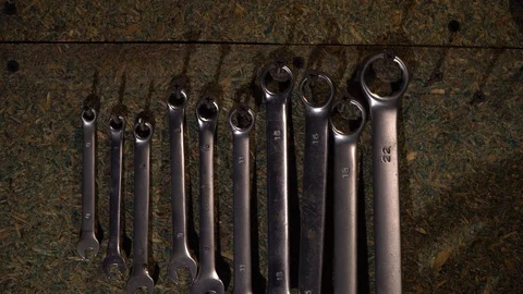 The man selects the right wrench from the set Stock Footage