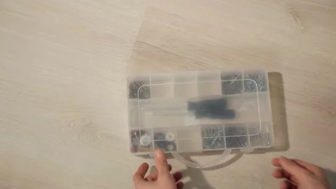Man selects tool for repair Stock Footage 100059301