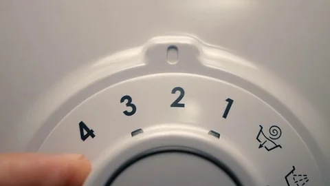 The man selects the washing program Видео 84479463