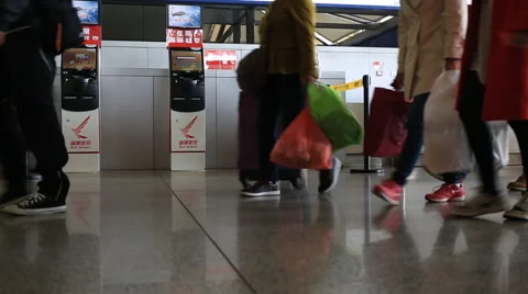 Man at self check-in machine in Kunming international airport terminal Video stock 49033343